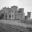 View of Rossie Castle from S showing the E wing partly demolished.