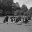 View of pipe band in grounds.