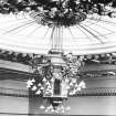 Interior detail of gilt light fittings