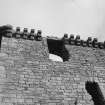 Detail of machicolated parapet, Crichton Castle.