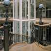 Lift shaft and decorative metalwork lamp posts and railings, detail