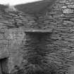 Interior.
Barn, detail of 'bink' in NW angle.