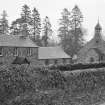 General view of New Clunie Free Church School and schoolhouse, with New Clunie Free Church in the background.