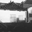 Excavation photograph: location shot
General view from SE showing partially demolished building

