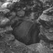 Excavation photograph:
View of man in well at excavation in High Street, Arbroath

