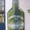 View of Tobermory Single Malt Scotch Whisky bottle-shaped sign