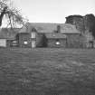 View of Evelaw Tower and farm buildings from W.