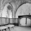 Interior view of Towie Barclay Castle showing Great Hall with fireplace.