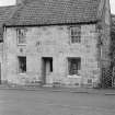 View of front elevation of house in Cross Wynd, Falkland.