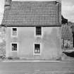 View of front elevation of house in Cross Wynd, Falkland.