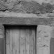 Detail of carved door lintel on E facade of the Salmon Fisher's House, Panha', Dysart.