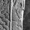 Detail of cross-slab at Ardchattan, showing musicians on the right of the cross-shaft on face A.
 
