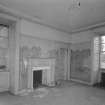 Interior view of Capelrig House showing drawing room on ground floor with fireplace.