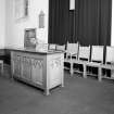 Interior.
Detail of 'elders' seats and preaching desk.