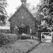 General view of gable end, showing garden gate, House of Falkland East Lodge.