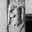 Detail of Pictish cross-slab Aberlemno 3, showing right-hand angel on face A.
 

