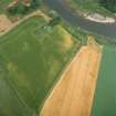 Oblique aerial view centred on the cropmarks of the deserted medieval village, taken from the SW.