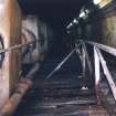 Interior.
Passenger Tunnel, view of water main and stairway section (timber stairway in poor condition).