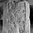 Detail of carving on upper part of face C of St Madoes cross slab in Perth Museum.