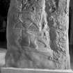 Detail of carving on lower part of face C of St Madoes cross slab in Perth Museum.