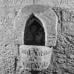 View of niche with basin inscribed 'Sancti Nicolai de Strathbroke', now at Carlowrie.
Small wall sculpture with inscription. (Originally from NT07SE 5; 0757 7269; West Lothian, Uphall: St Nicholas's Church)