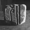 View from side of face of a fragmented Pictish Symbol Stone from Little Ferry Links, now in Dunrobin Museum.