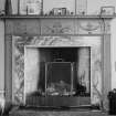 Interior view of Glassingal House showing fireplace in library.