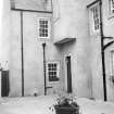 View of buildings around courtyard.