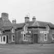 General view of High Street, Ayton, from N, including Mace Mini-Market and antiques shop.