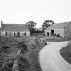 General view of farm cottage and barn from N.