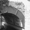 View of E bridge from SW, showing iron-plated arch.
