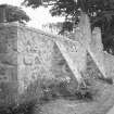 General view of churchyard wall.