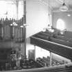 Interior.
View of preaching hall from centre gallery to pulpit and organ.