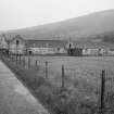 View of farmhouse and steading from N.