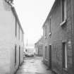 General view down alley between Nos 60 and 62 Church Street