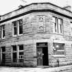 Mansefield House, High Street.
General view of corner entrance with plaque above the door.