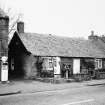 Edinburgh, Davidson's Mains.
General view of Hawthorn cottage with old 'Shell' Petrol pumps outside.