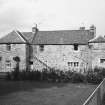 View of farmhouse from SE.