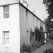 View of farmhouse from SW.