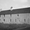 General view of farmhouse from NW.