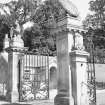 Glencarse House, West Lodge and Gatepiers.
General view of the gatepiers with stone eagles, with the West lodge beyond.