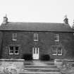 View of South elevation of farmhouse.