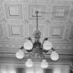 Interior view of Stracathro House showing detail of board room ceiling and light fitting.