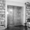 Interior view of Stracathro House showing library doors.