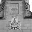 Detail of armorial panel above front entrance.