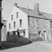 View of George Street, Eyemouth, from S, showing the premises of George Craig painter and decorator.