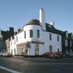 General view of 1 Dunira Street, Comrie, showing the premises of Brough and Macpherson from SE.