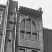 View of window and cantilevered brackets on E wall of Martyr’s Public School, Glasgow.
