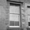 View of specimen ground floor window with grill, Martyr’s Public School, Glasgow.