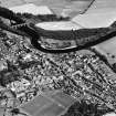 Oblique aerial view centred on the town of Coldstream with road bridge adjacent, taken from the W.
